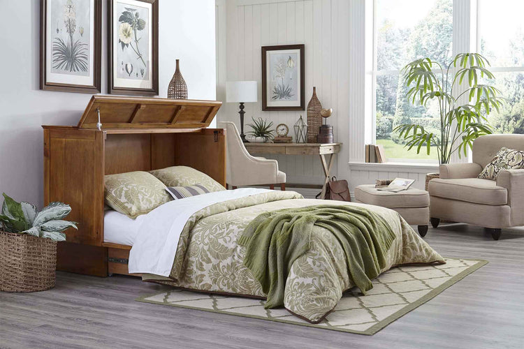 Murphy cabinet bed folded into a stylish wood cabinet with pull-out storage drawer
